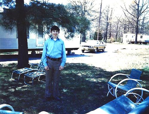 The author, in front of his tiny home, c. 1972